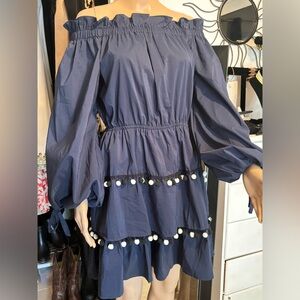 INA Navy Blue off the sholder dress size Large.  Pompom skirt detail
